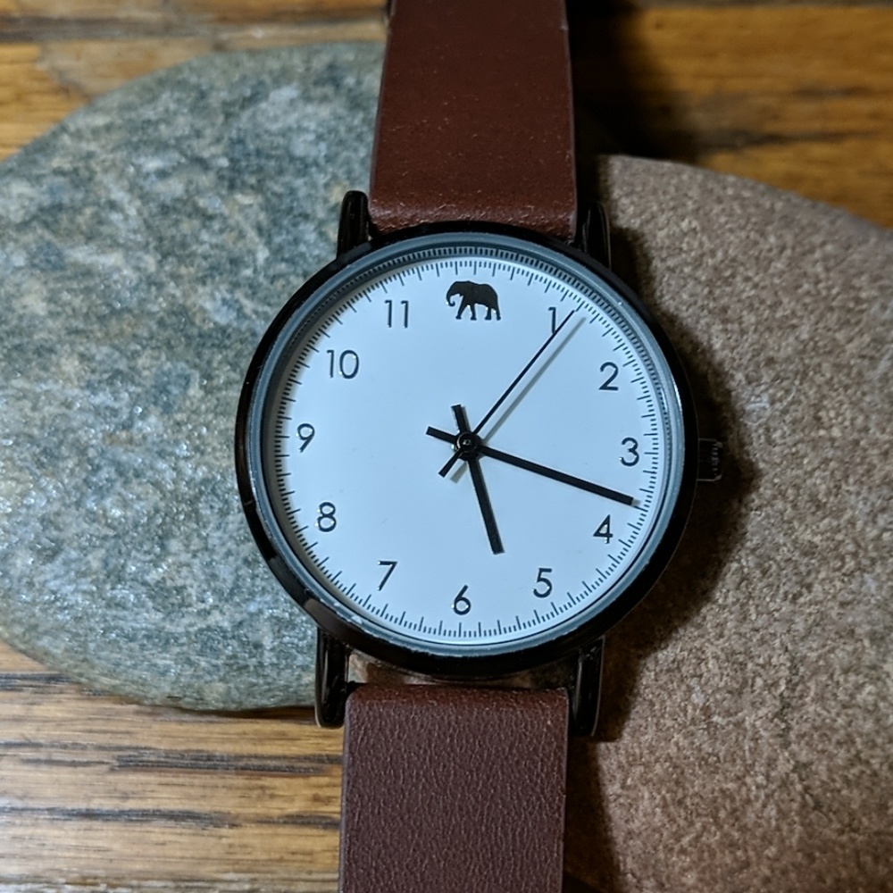 Simple watch with small elephant